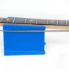 holds back bass strings so you can do spot work without removing