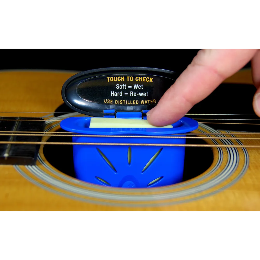MN300: The Humitar - Acoustic Guitar Soundhole Humidifier Humitar Guitar Humidifier hangs from strings.