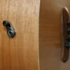 point slightly backwards towards the player