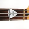 Pick Capo works great on Bass Guitars to hold down E string against 1st Fret